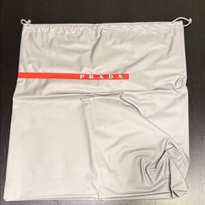 Prada Silver Bag with Red Accent